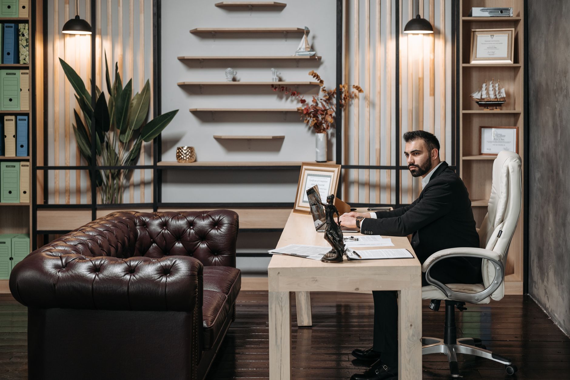 Professional working at a desk in a modern office