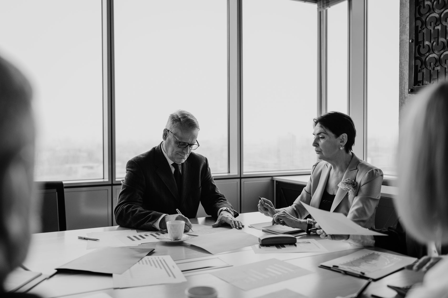 Professionals collaborating in a meeting