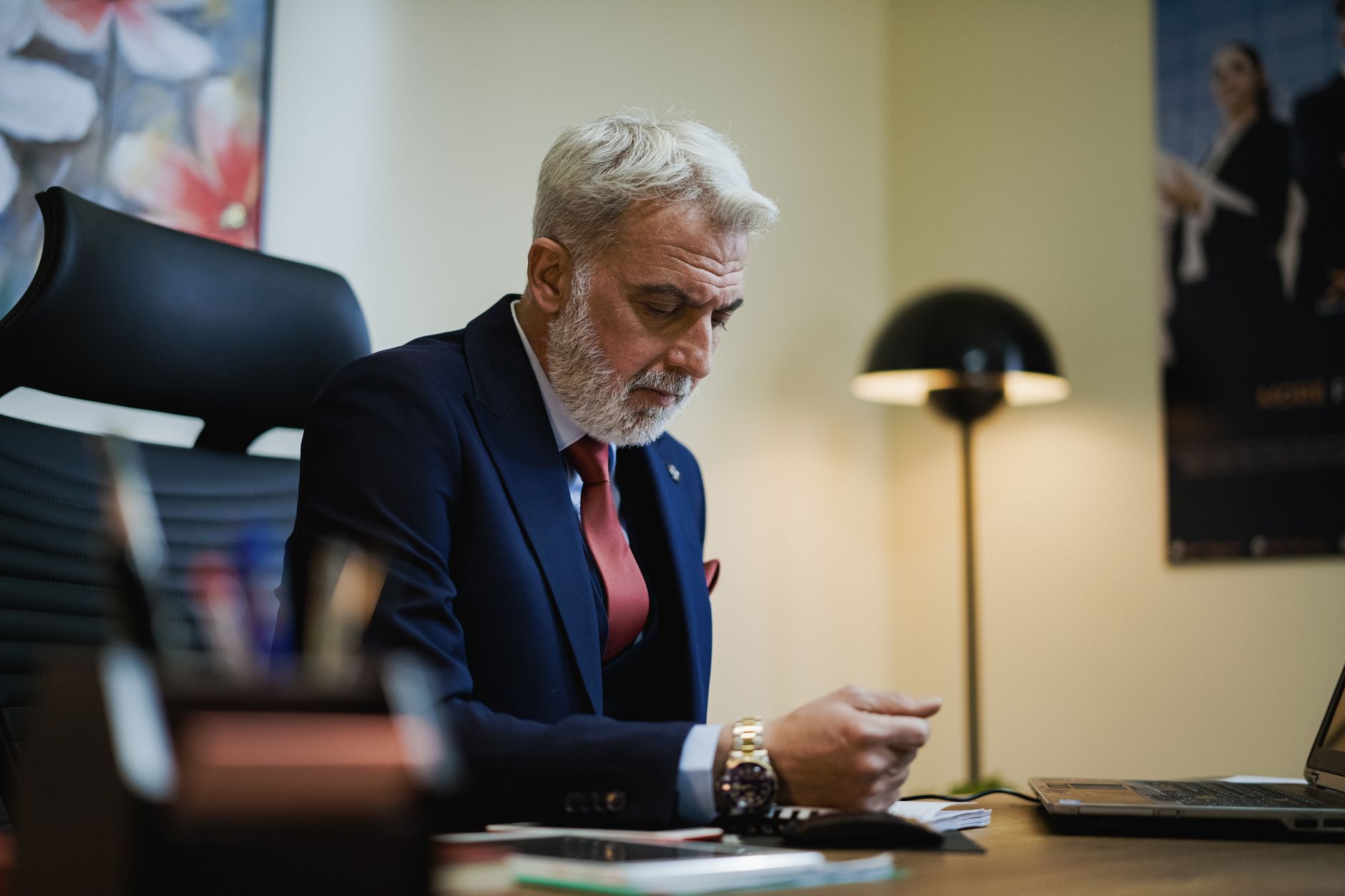 Businessman reviewing work at an office desk